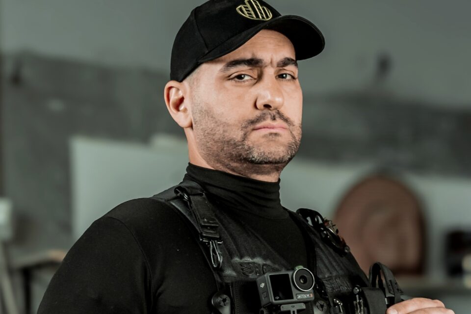 Zeher Khalil, Building Consultant and Chief Inspector at Site Inspections, wearing the black inspection vest and cap