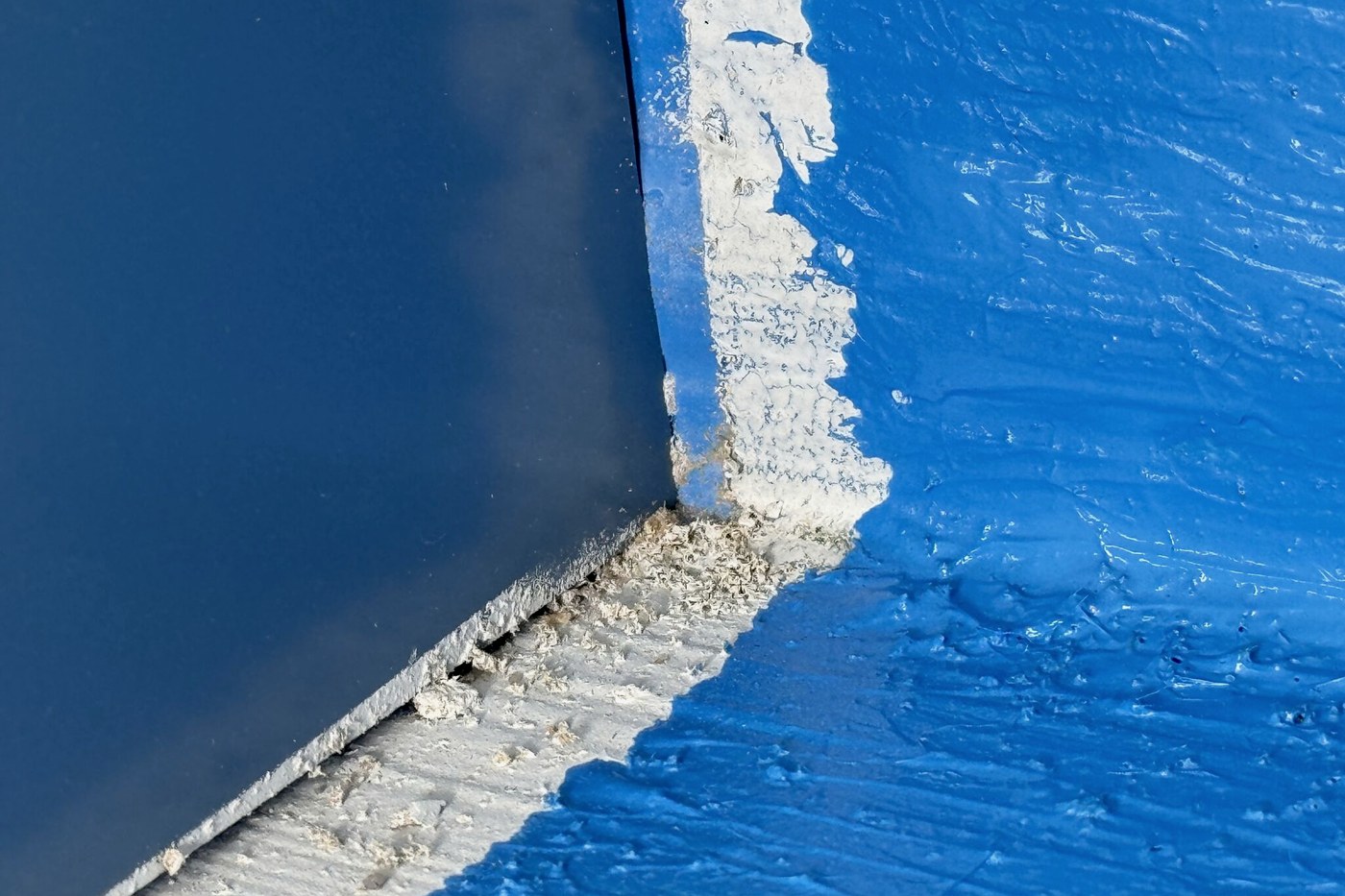 Failed waterproofing at a wall junction