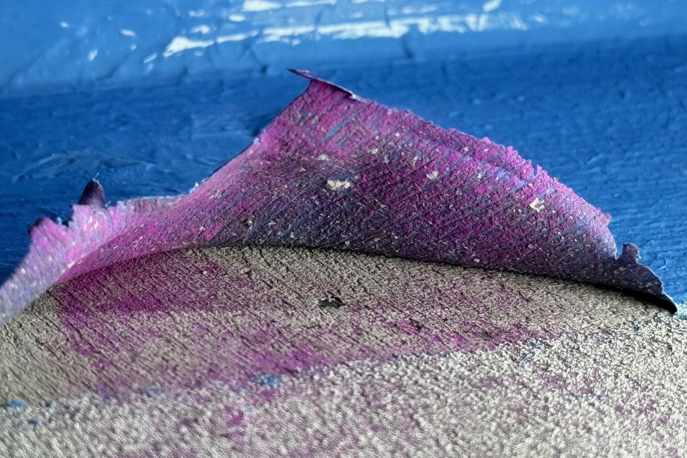 Waterproofing membrane lifting away from a balcony substrate, found during a building defects inspection